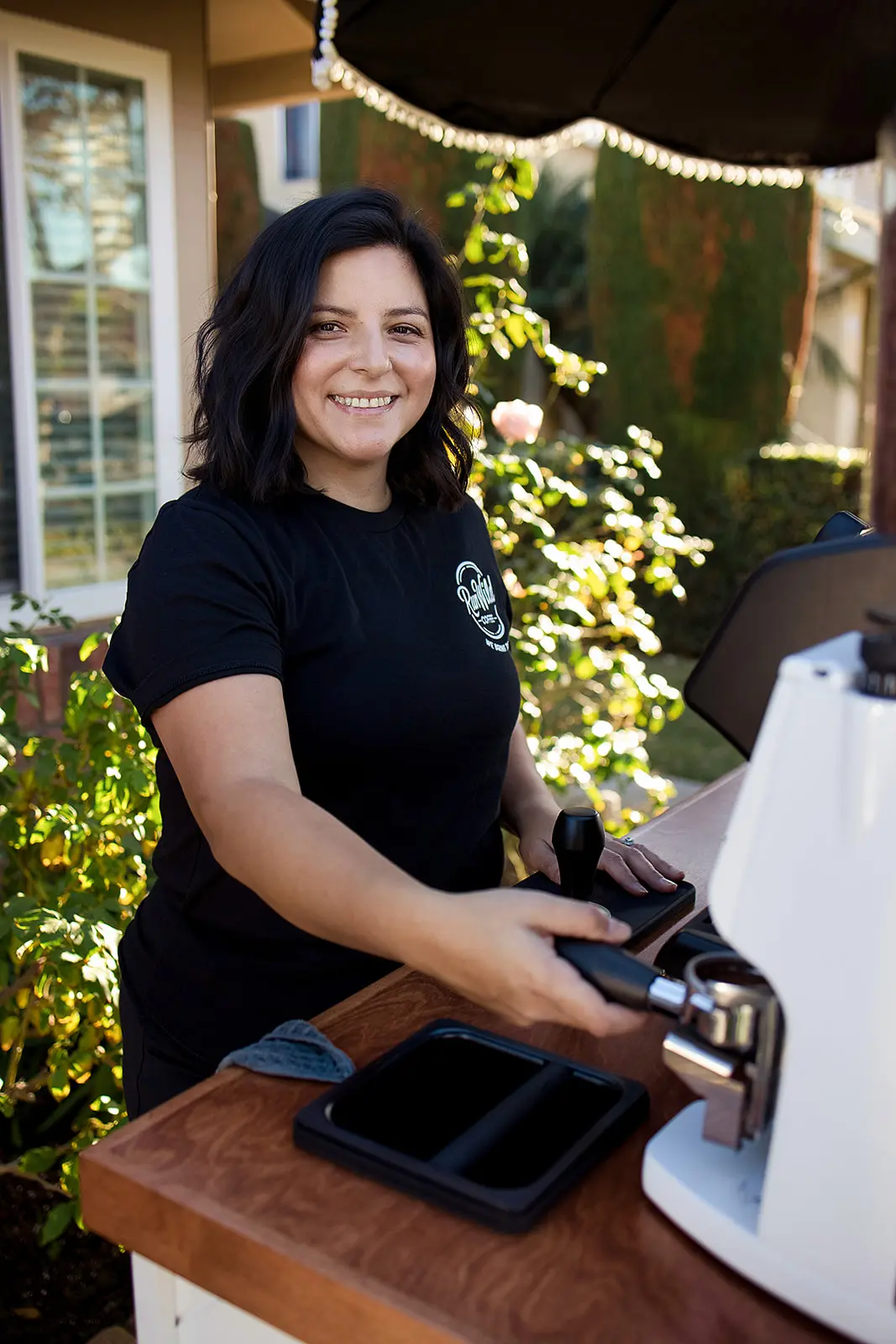Jacky Alonso, founder of Run Wild Coffee, crafting espresso